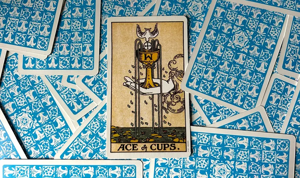 Ace of Cups Reversed: Blocked Emotions and Their Deeper Meaning in Tarot Readings 2 Ace of Cups reversed Rider-Waite-Smith tarot card showing overturned chalice and spilling water – blocked emotions symbolism