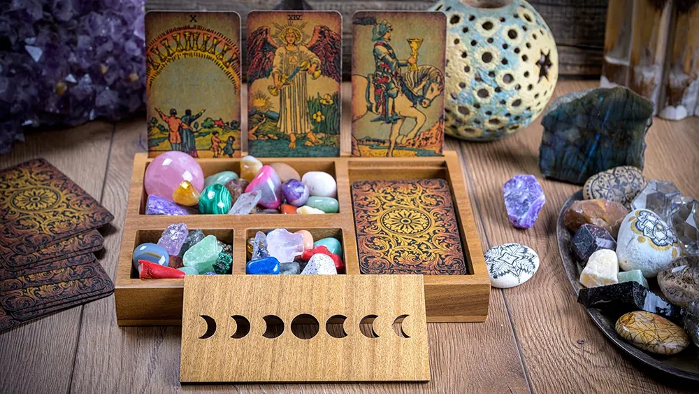 Innovative tarot deck storage ideas including wooden boxes and fabric pouches for optimal tarot deck care