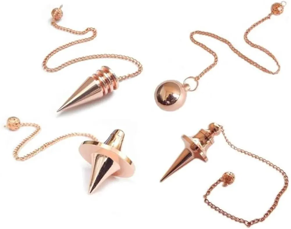 Assortment of different types of pendulums used in tarot pendulum techniques for clarity