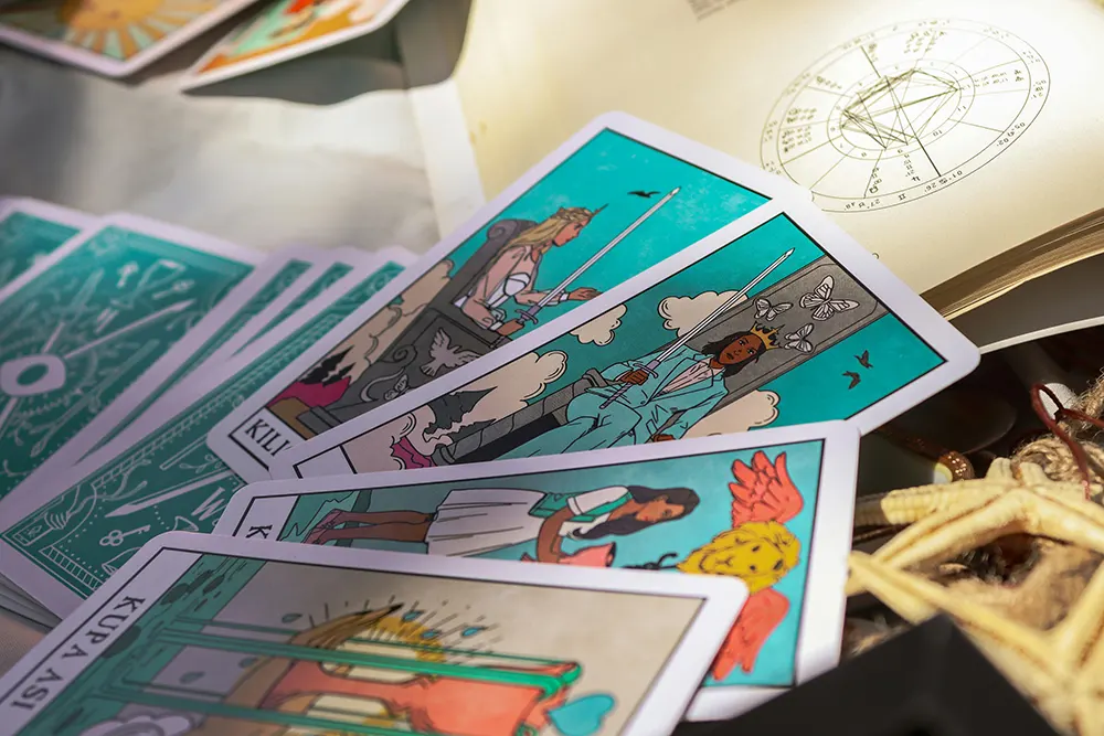 Astrology vs Astronomy: Unraveling the Cosmos Through Science and Belief 8 Modern astrologer reading tarot with zodiac symbols in astrology vs astronomy